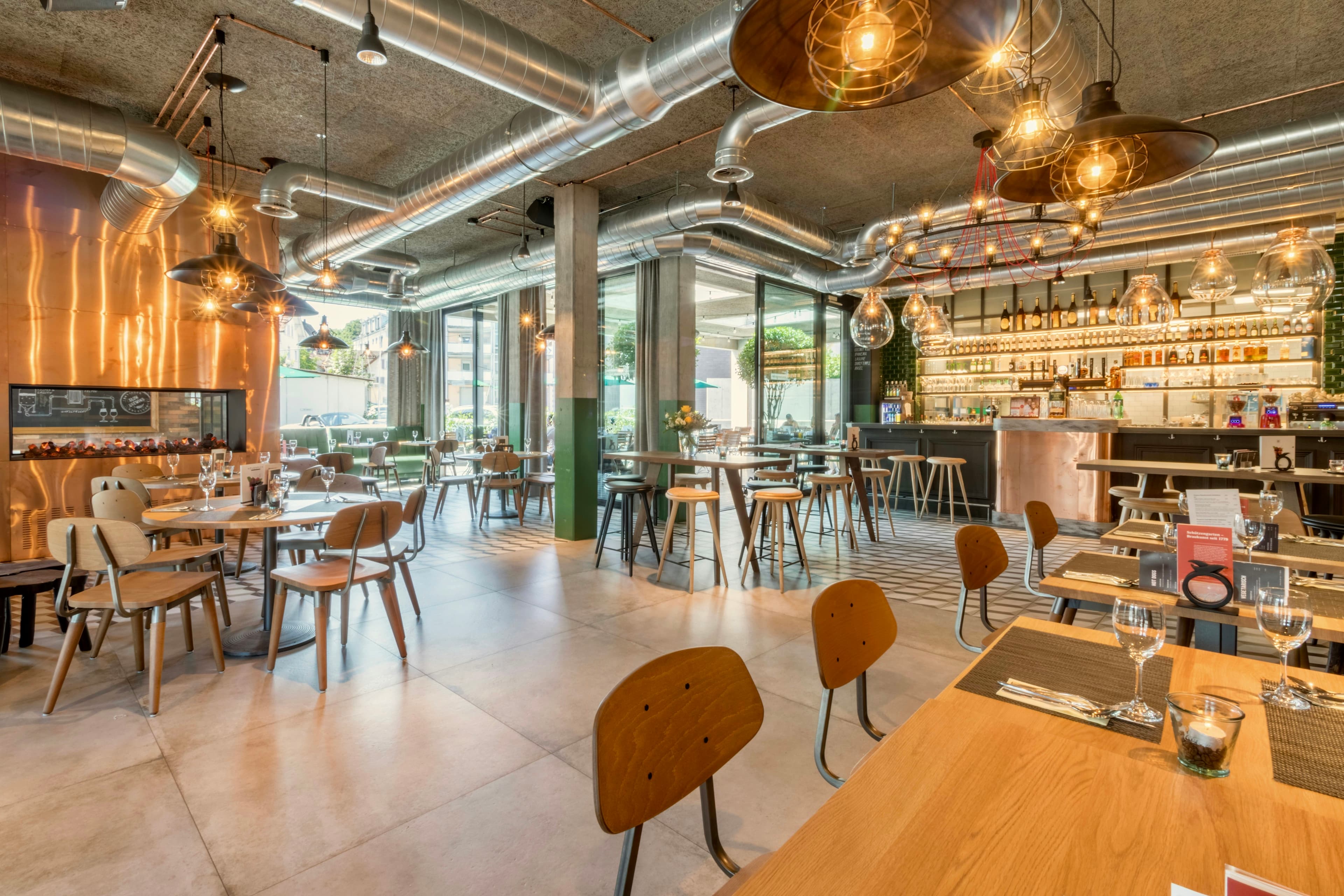 Tendances 2026 en architecture intérieure : matériaux durables et intelligents pour restaurants, hôtels et cafés à Paris, en Île-de-France et sur la Côte d'Azur